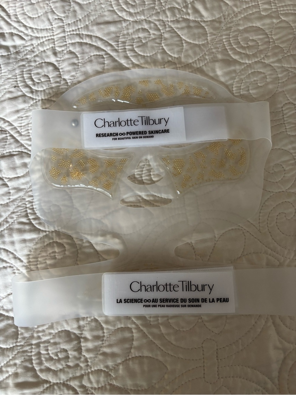 Charlotte Tilbury Clear LED Facial Mask with Gold Accents